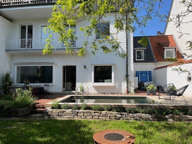 Einzigartige Maisonette-Wohnung mit Garten und Pool Einzigartige Maisonette-Wohnung mit Garten und Pool